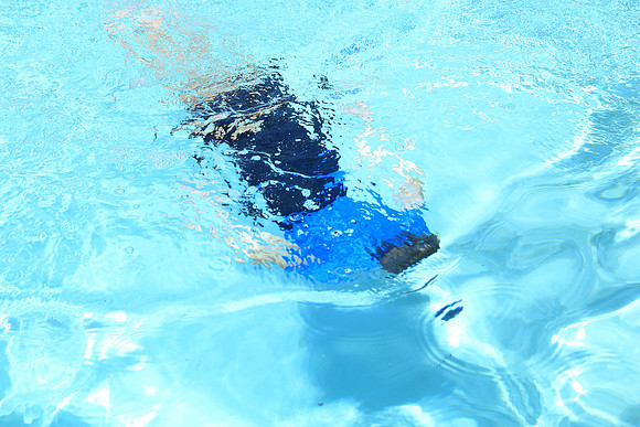 Boy in Blue Pool