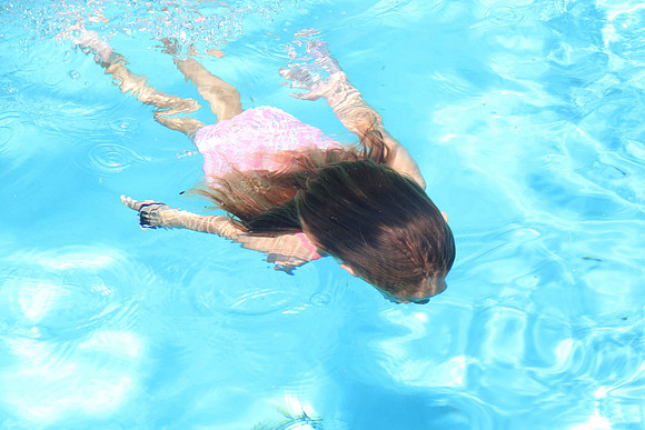 Girl in Blue Pool
